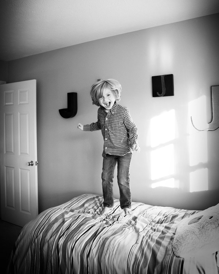 jumping-on-bed-kids-lifestyle-photographer-rochester-ny